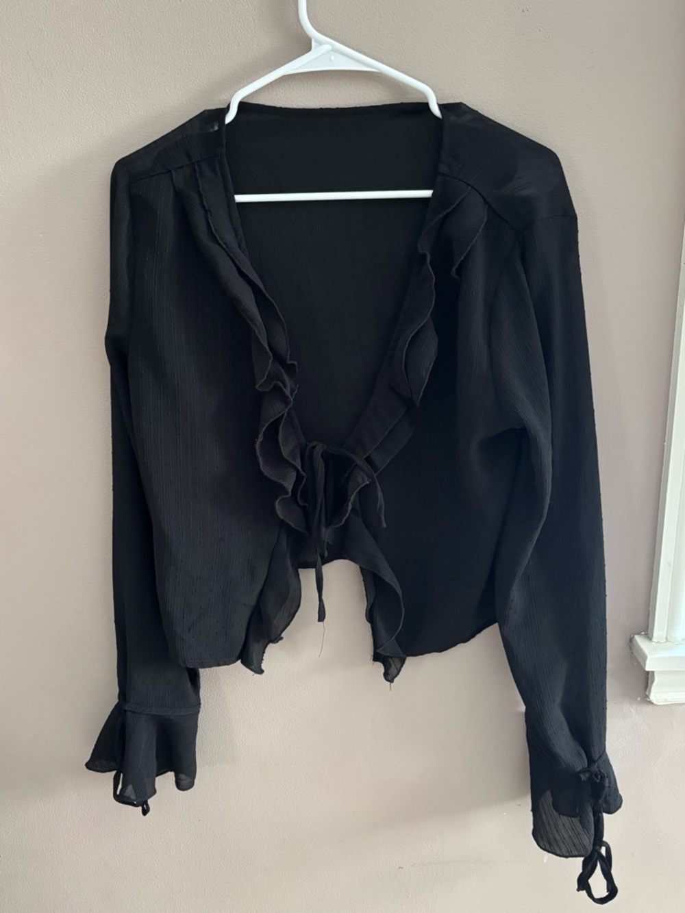 SHEIN’S Black Ruffle Tie-Front Blouse